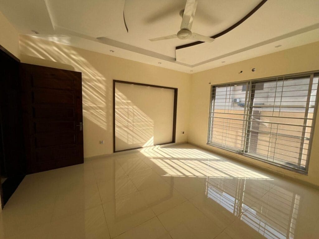 Spacious Bedroom with Tile Flooring – 15 Marla House Valancia Society Lahore