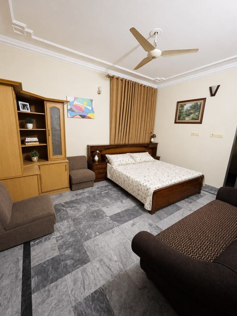 Bedroom 1 in 10 Marla triple storey house for sale in Gulberg 3, Lahore