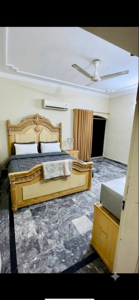 Bedroom 3 in 10 Marla triple storey house for sale in Gulberg 3, Lahore