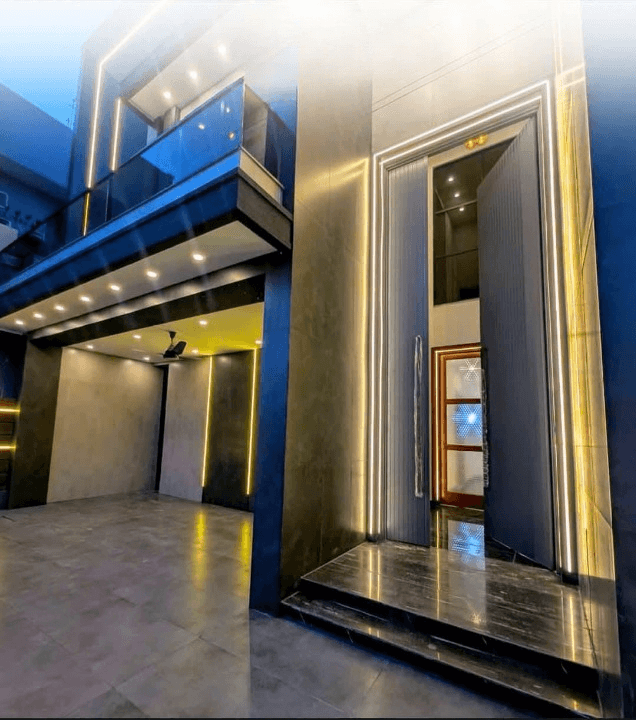 1 Kanal house for sale in IEP Town Sector A, Lahore - main entrance with contemporary lighting design