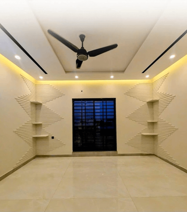 1 Kanal house for sale in IEP Town Sector A, Lahore - bedroom with decorative geometric wall shelving