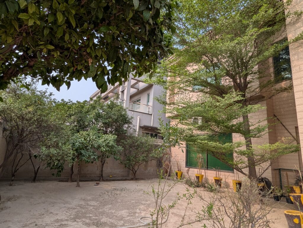 1 Kanal House for Sale – Valancia Society Block C1, Lahore | Side Yard and Garden Area
