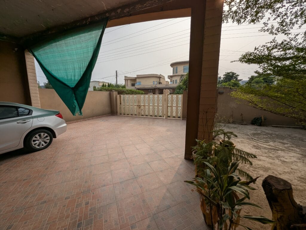 1 Kanal House for Sale – Valancia Society Block C1, Lahore | Covered Car Porch and Driveway